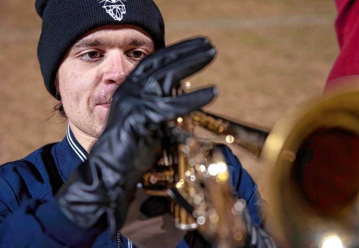 Cameron Powell practices with the rest of the trumpet players in the UMass marching band who were practicing for the Macy’s Thanksgiving Day Parade. 