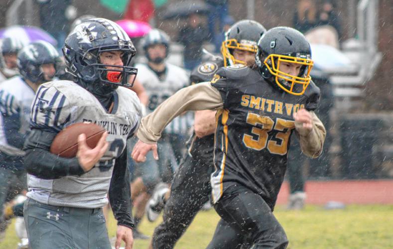 Franklin Tech’s Wyatt Whitman runs for a third-quarter touchdown during the Eagles’ 16-8 overtime loss to Smith Vocational on Thursday at Mountain View School in Easthampton.