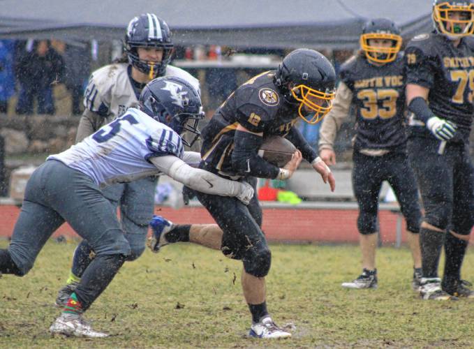 Smith Vocational’s Jared Baer (12) carries the ball against Franklin Tech during the Vikings’ 16-8 overtime win on Thursday at Mountain View School in Easthampton.