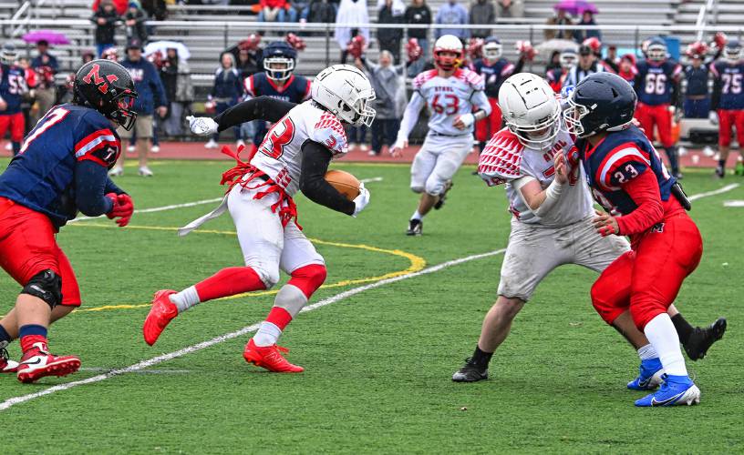 Athol’s Sawyer Lefsyk scores on this pass play early in the first quarter to give Athol the lead over Mahar in Orange on Thursday.