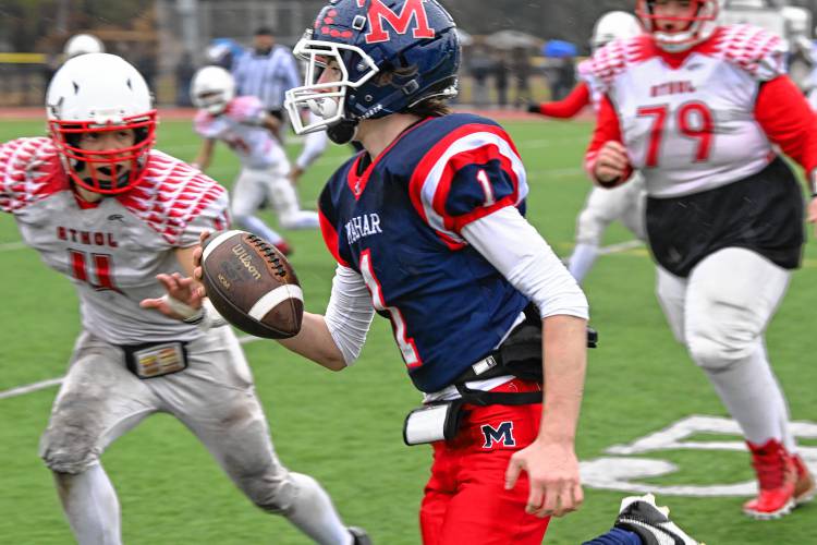 Mahar’s Morgan Softic picks up yards against Athol in Orange on Thursday.