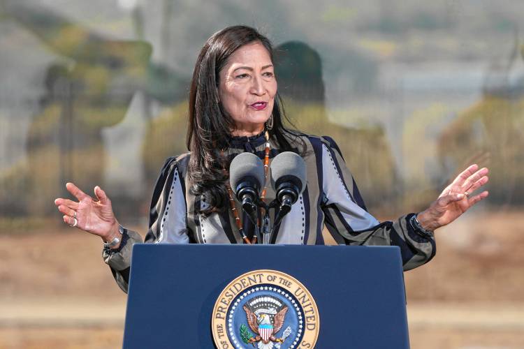 U.S. Secretary of the Interior Deb Haaland speaks at the Gila Crossing Community School on Oct. 25 in Laveen, Ariz., where President Joe Biden delivered a formal apology on behalf of the nation for the genocidal impact of U.S. Indian boarding schools.