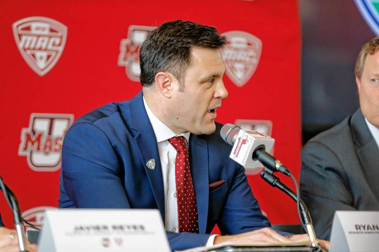 UMass Director of Athletics Ryan Bamford speaks during a press conference at the Martin Jacobson Football Performance Center earlier this year regarding the University of Massachusetts joining the Mid-American Conference. Bamford is working with Chad Chatlos and his TurnkeyZRG search firm to hire the school’s next head coach.