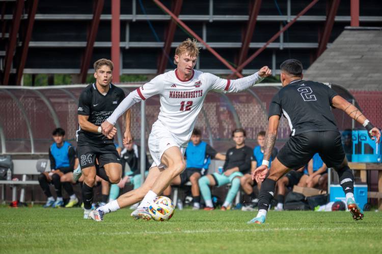 Alec Hughes (12) and the UMass men’s soccer team play Virginia on Saturday in the NCAA Division 1 Sweet 16. 