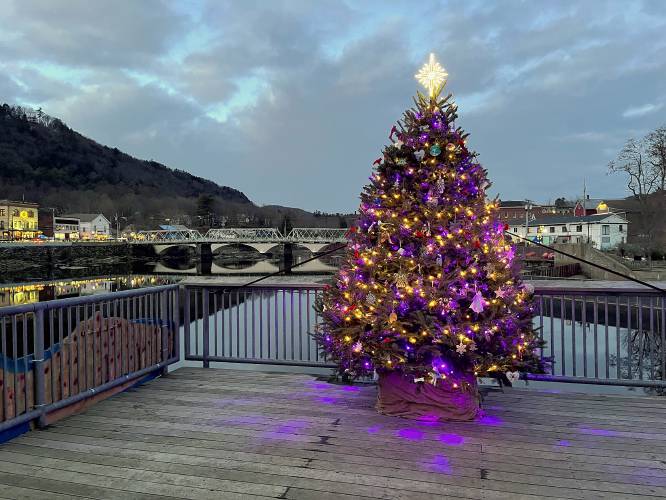 A Christmas tree stands overlooking the Iron Bridge in Shelburne Falls.