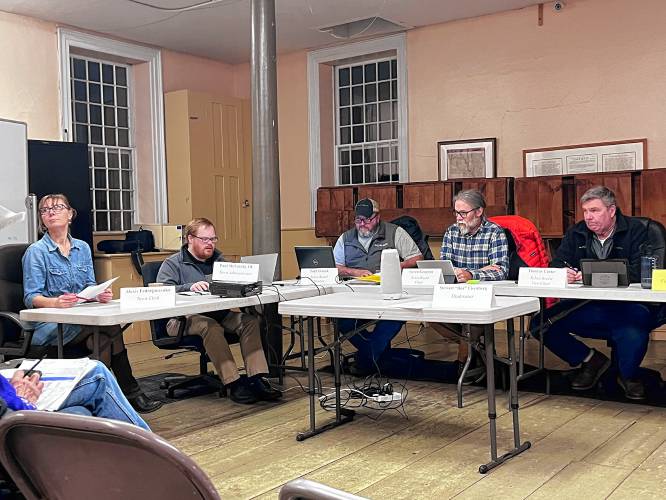 Ashfield Town Clerk Alexis Fedorjaczenko, Town Administrator Paul McLatchy III, and Selectboard members Todd Olanyk, Chair Steven Gougeon and Tom Carter.