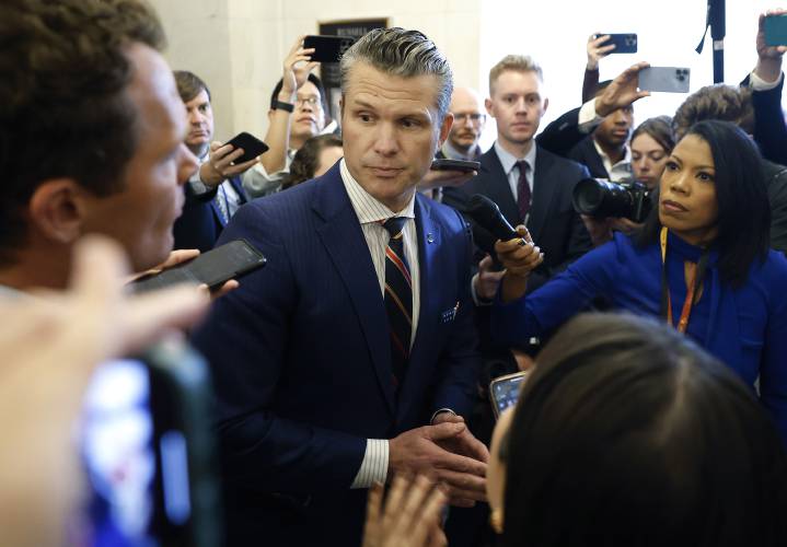 Secretary of defense nominee Pete Hegseth leaves the Russell Senate Office Building in Washington on Nov. 21.