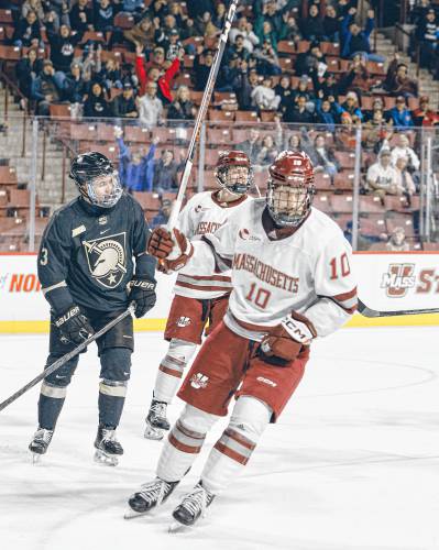 UMass’ Dans Locmelis (10) celebrates a goal against Army last week at the Mullins Center.