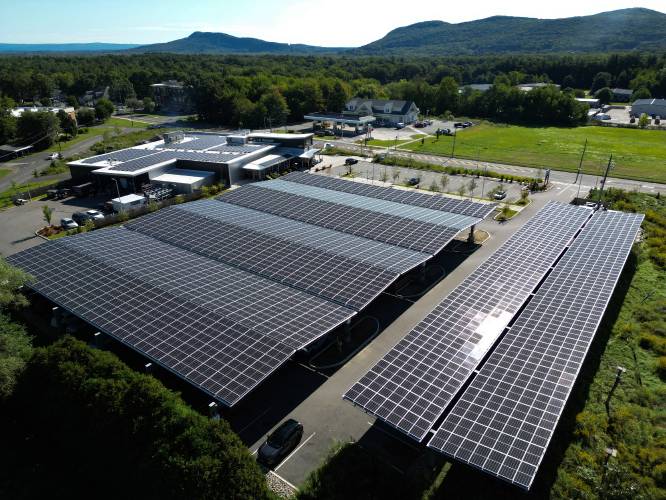 Solar panels at River Valley Co-op in Easthampton. According to Sam Anderson, Mass Audubon’s director of legislative and government affairs, the clean energy law that Gov. Maura Healey signed includes “very strong” language prioritizing site sustainability and outlining mitigation hierarchy, stating that projects should minimize environmental and land use concerns — and if such impacts are unavoidable, mitigate siting impacts.