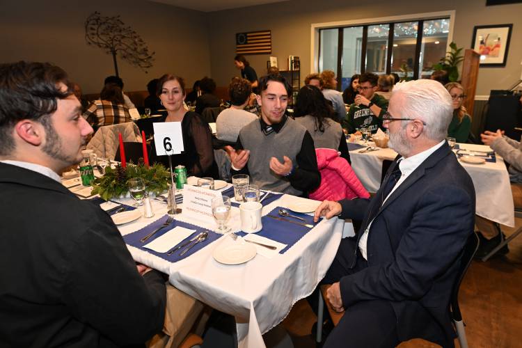 Franklin County Technical School Superintendent Richard Martin, right, speaks with attendees at the Franklin County Area Superintendents’ Association’s annual awards dinner held at the school on Thursday night.