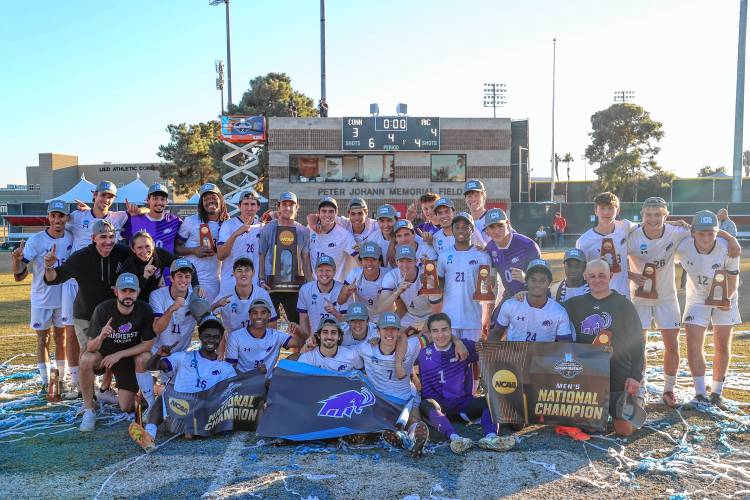 The Amherst College men’s soccer team celebrating its 2024 NCAA Division 3 national championship after defeating Connecticut College 4-3 in penalties in the title game on Saturday afternoon in Las Vegas.