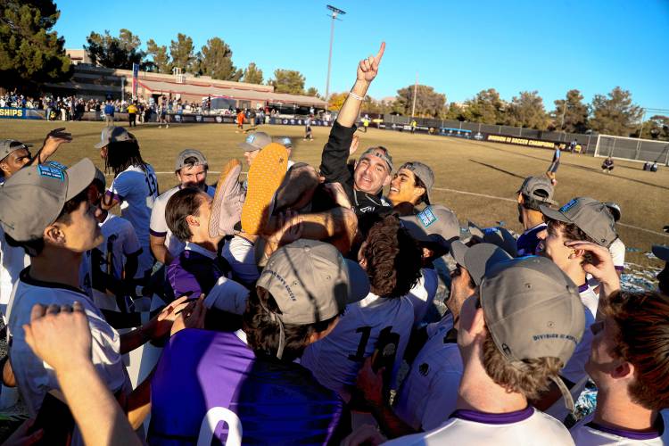 The Amherst College men’s soccer team celebrating its 2024 NCAA Division 3 national championship after defeating Connecticut College 4-3 in penalties in the title game on Saturday afternoon in Las Vegas.