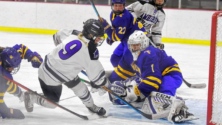 Amherst College’s Maeve Reynolds (9) scores a goal against Williams College earlier this season.