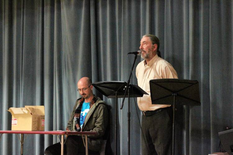 Left, Town Clerk John Paganetti and, right, Town Moderator James McRae