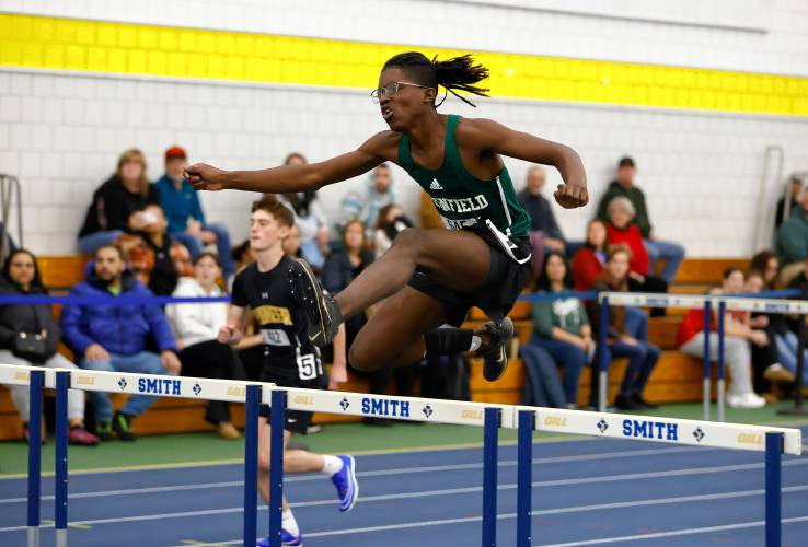 Greenfield’s Javion Williams competes in the boys 55 meter hurdles Thursday at Smith College.