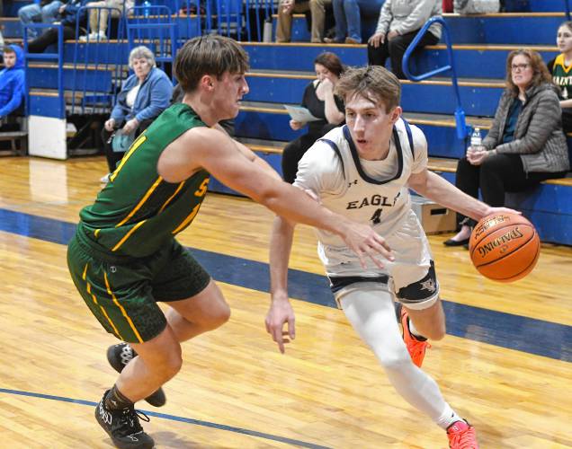 Franklin Tech’s Dylan Cullen drives to the basket against Saint Mary’s during the Eagle Holiday Classic  in Turners Falls on Thursday. 