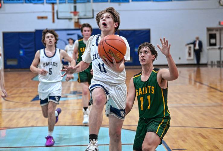 Franklin Tech’s Caleb Johnston goes up for two against Saint Mary’s during the Eagle Holiday Classic  in Turners Falls on Thursday.