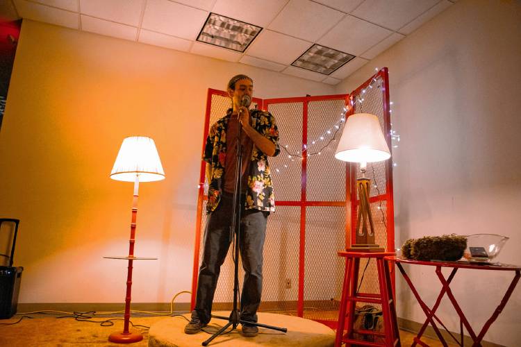 Host and co-creator Nisse Greenberg introduces speakers during The LAVA Center’s latest “Beautiful Disasters” storytelling session in Greenfield.