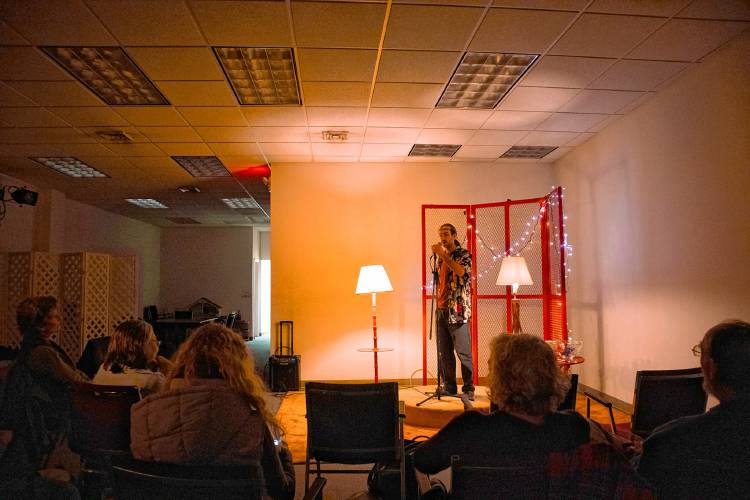 Host and co-creator Nisse Greenberg introduces speakers during The LAVA Center’s latest “Beautiful Disasters” storytelling session in Greenfield.